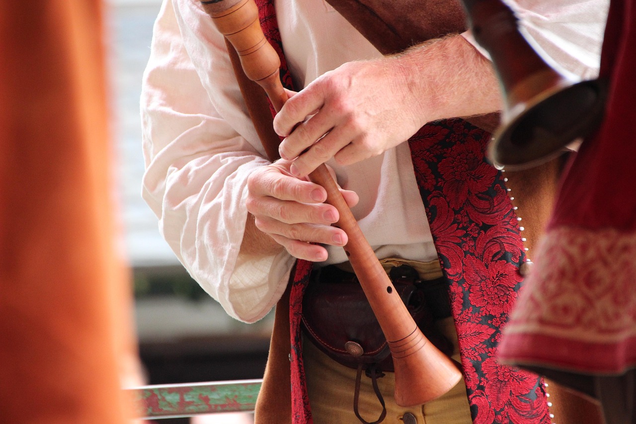 A silver flute resting in its case